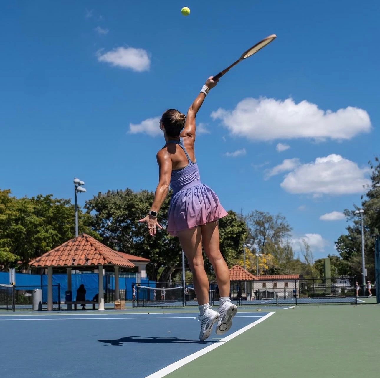 Cristina playing tennis
